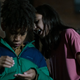 Ian Foreman and Madison Taylor Baez get close